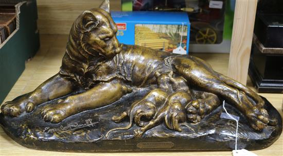 An Art Deco terracotta model of a panther and cubs, signed Emile Raouff length 57cm